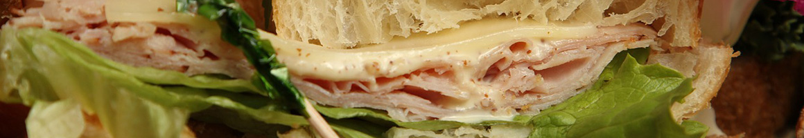 Eating Pizza Sandwich at Bennington Pizza House restaurant in Bennington, VT.